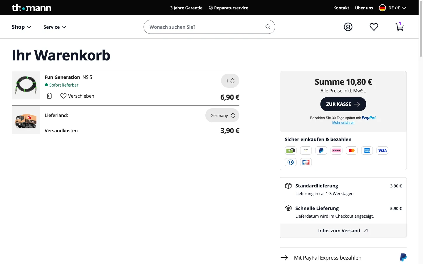 Cart page showing a computed shipping cost line next to the order total, with an "all prices include VAT" note beneath it